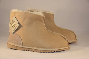 Snug. Unisex Ankle Ugg boot with heel support. Colours: Natural & Soft Pink