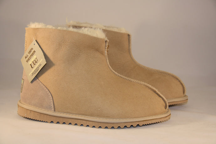 Snug. Unisex Ankle Ugg boot with heel support. Colours: Natural & Soft Pink