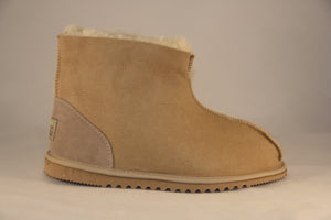 Snug. Unisex Ankle Ugg boot with heel support. Colours: Natural & Soft Pink