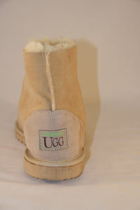 Snug. Unisex Ankle Ugg boot with heel support. Colours: Natural & Soft Pink